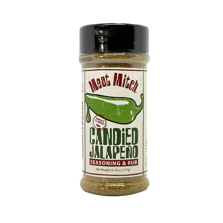 A clear plastic spice shaker with a black lid and a beige label wrapped around its middle. The label features a green jalapeno pepper illustration and the text "Meat Mitch" in a stylized font at the top. Below the jalapeno image, it reads "SWEET N HEAT" in small letters. The main text on the label is "CANDIED JALAPENO", followed by "SEASONING & RUB" in smaller letters. The net weight of the seasoning is listed as 6.25oz (177g). The shaker is filled with a light brown seasoning blend.